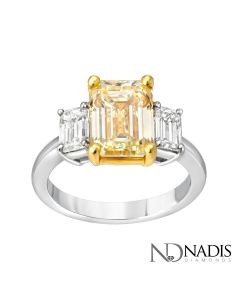 3.05 Ct. GIA Certified Emerald Cut Light Fancy Color Diamond Engagement Ring.