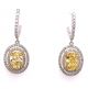 2.47 Ct. Total Weight GIA Certified Oval Shape Fancy Yellow Color Diamond Earrings.